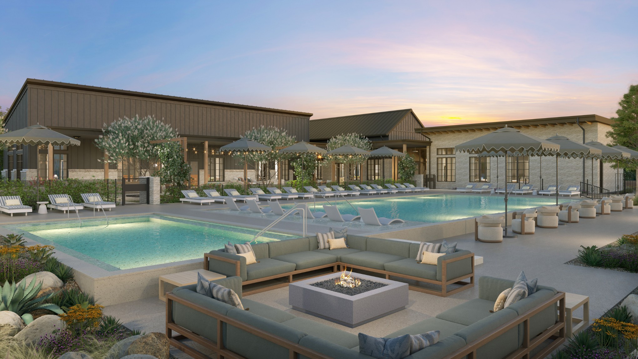 Resort-style swimming pool surrounded by lounge chairs, umbrellas, and a large seating area with fire pit